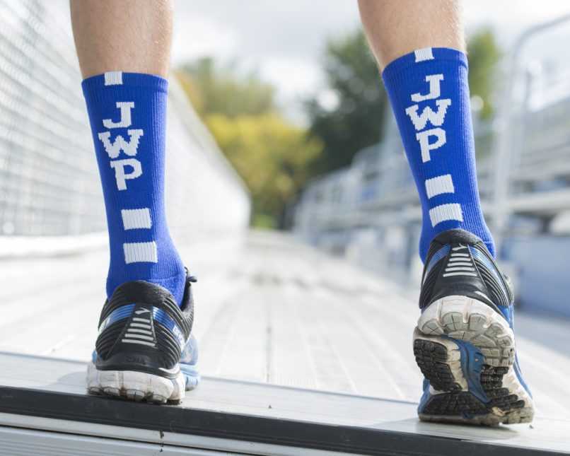 JWP socks and athletic shoes on feet