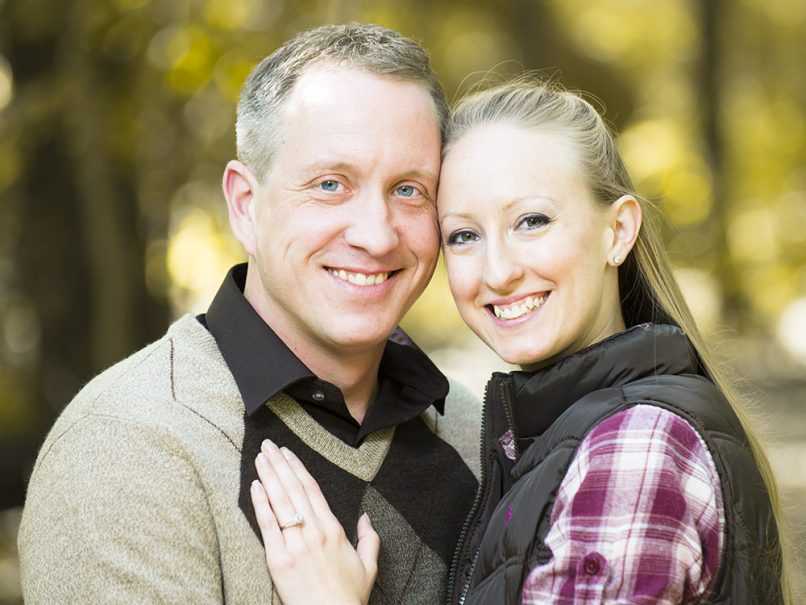 Happy couple posing on sunny day