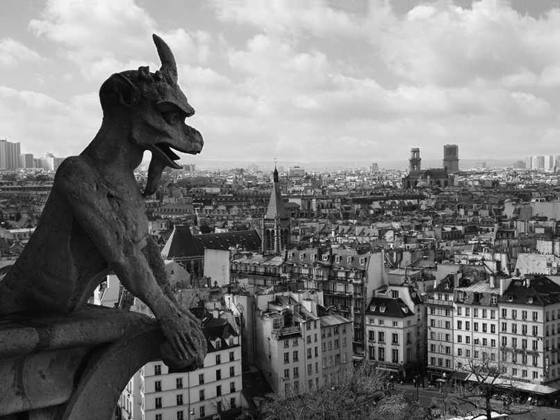 Gargoyle on roof of Notre Dame cathedral in Paris, France